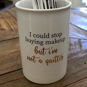 Makeup brush holder/container.